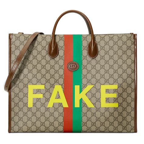 gucci mens print tote|Gucci handbags for men.